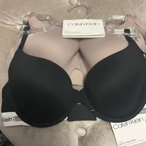 Calvin Klein two pack, lightly lined, Demi bras, convertible, straps, new