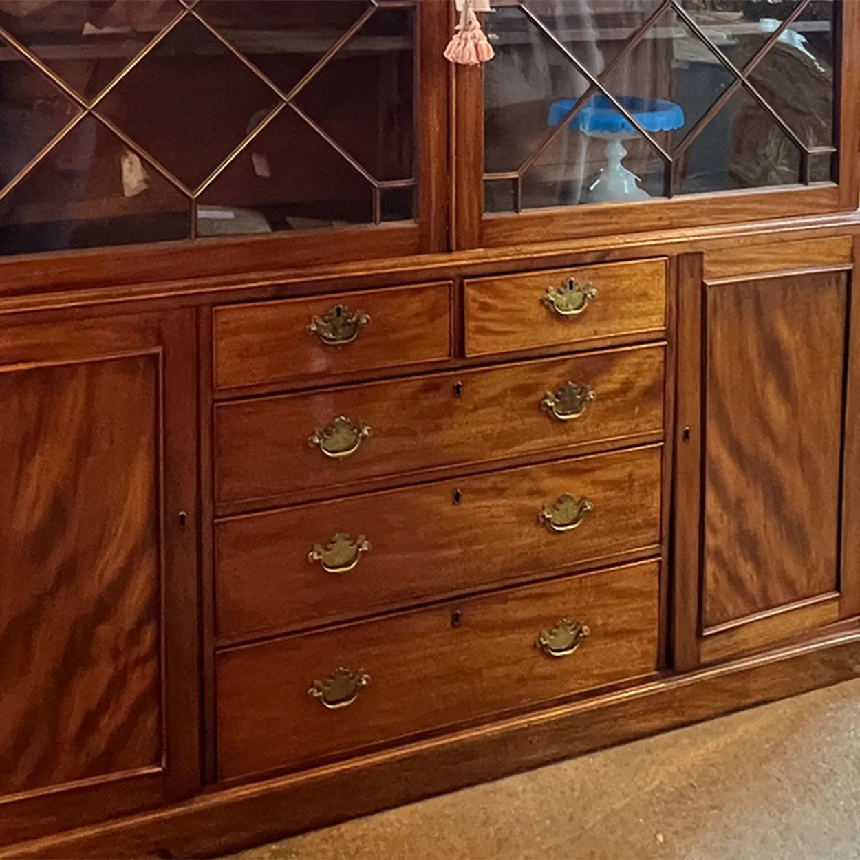 Large English Figured Mahogany and Glass Two-Part Breakfront Cabinet
